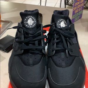 One pair of Nike Air Huaraches sneakers